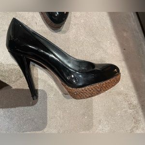 Stuart Weitzman black patent leather pumps